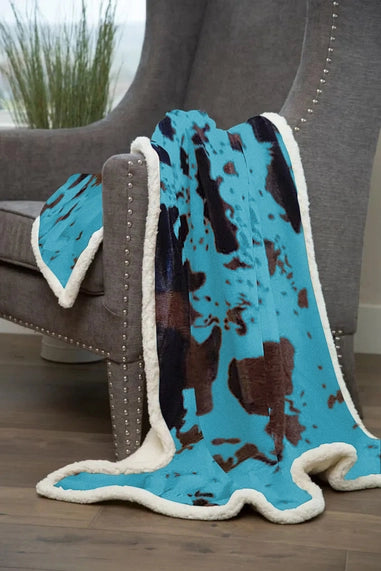 Turquoise Cow Print Sherpa Throw